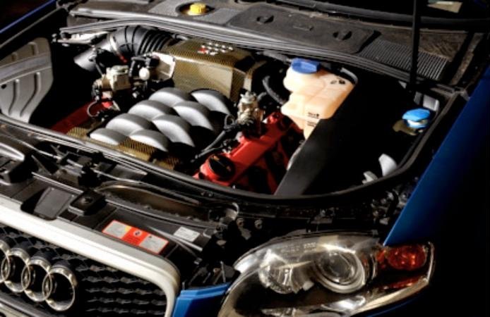 Engine bay of an Audi RS4 during diagnostics at DCR Auto Electrics, Gateshead